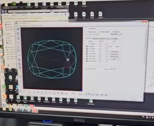 Stone being faceted to spec