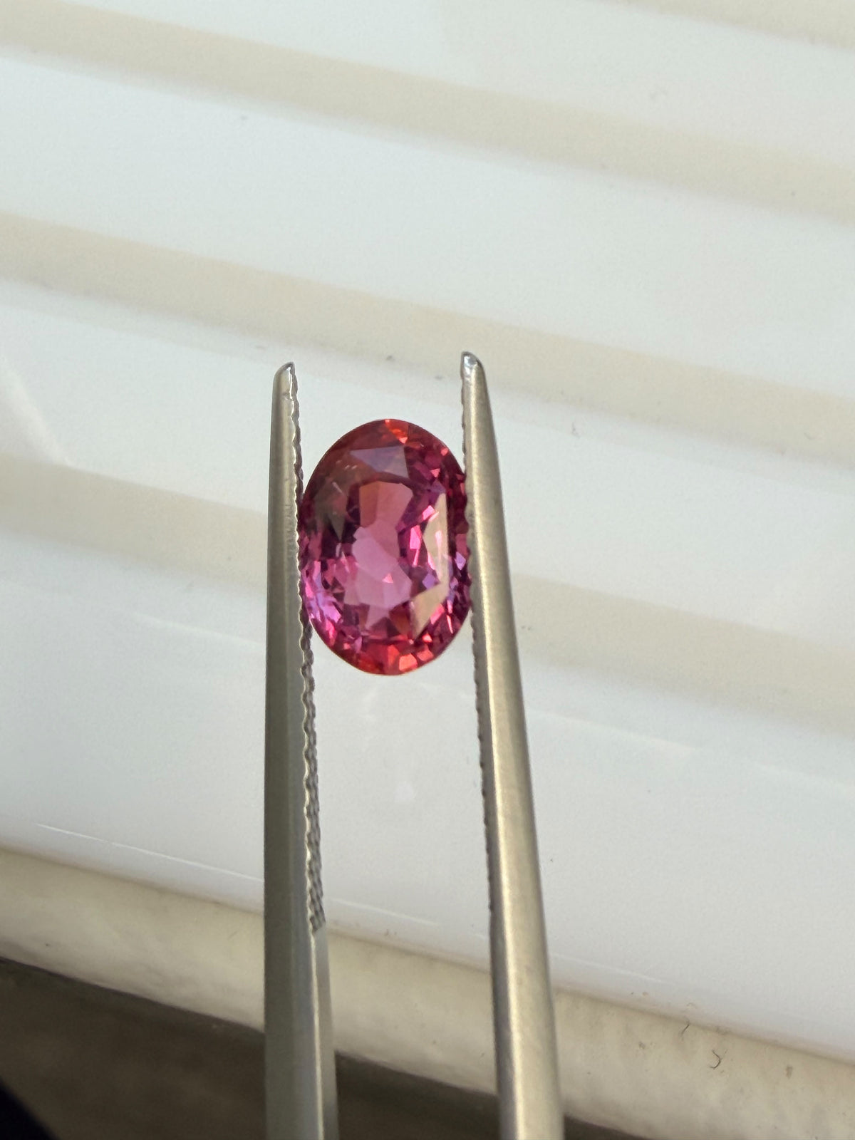Natural 1.73ct Oval Orangy Pink Sapphire