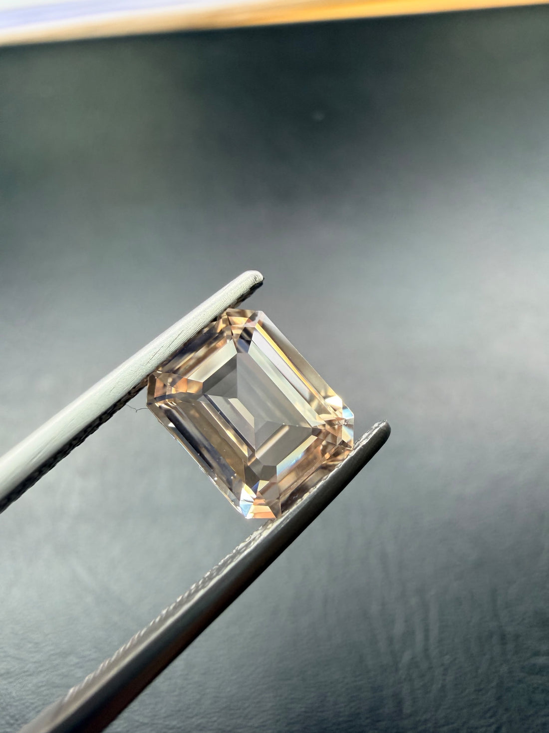 3.04ct Emerald Cut Peach Sapphire