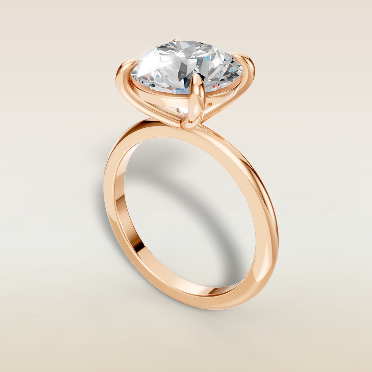Round Classic Solitaire engagement ring in rose gold, angled view
