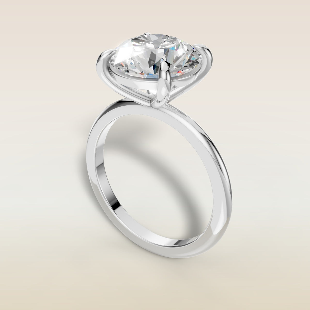Round Classic Solitaire engagement ring in white gold, angled view