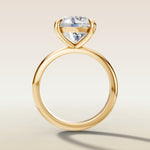 Round Classic Solitaire engagement ring in yellow gold, front view