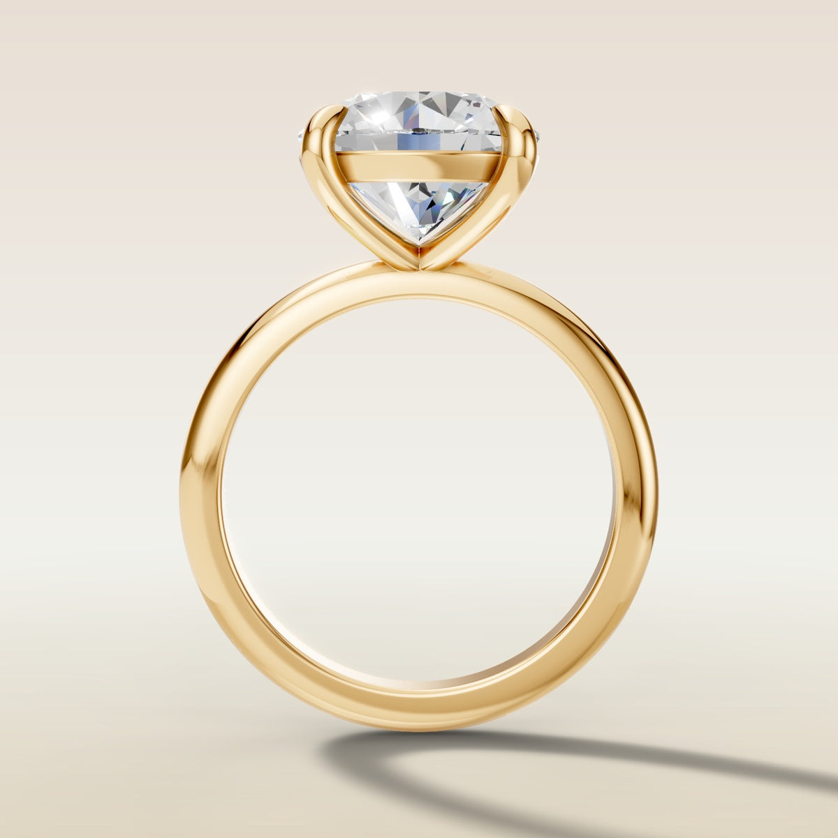 Round Classic Solitaire engagement ring in yellow gold, front view