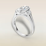 Moval Three Stone Full Bezel engagement ring in white gold, angled view