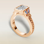 Emerald Full Bezel Floral Engraved engagement ring in rose gold, angled view
