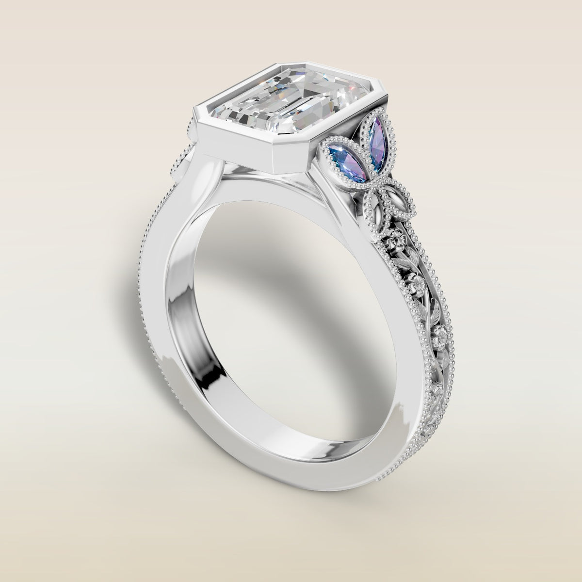 Emerald Full Bezel Floral Engraved engagement ring in white gold, angled view