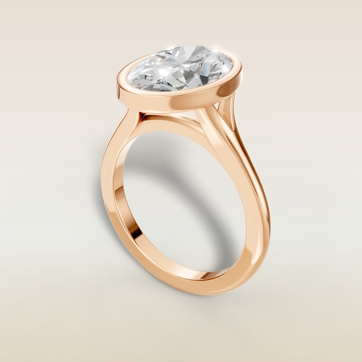Oval Full Bezel Split Shank engagement ring in rose gold, angled view
