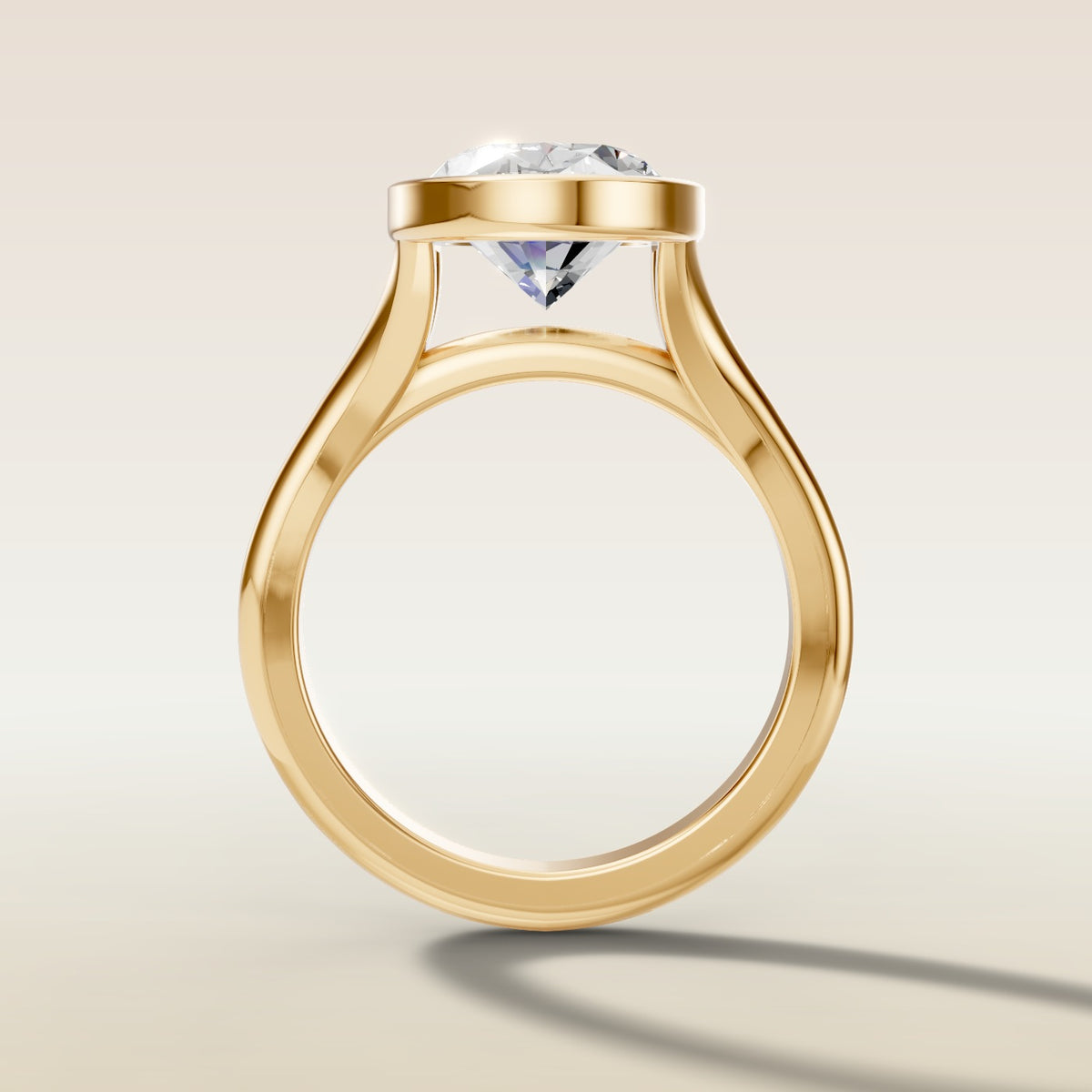 Oval Full Bezel Split Shank engagement ring in yellow gold, front view
