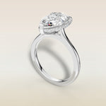 Pear Hidden Halo Cathedral engagement ring in white gold, angled view