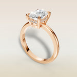 Cushion Low Profile Hidden Halo engagement ring in rose gold, angled view