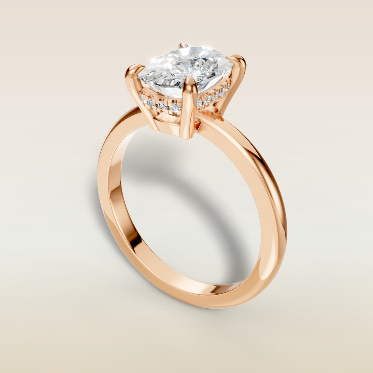Cushion Low Profile Hidden Halo engagement ring in rose gold, angled view