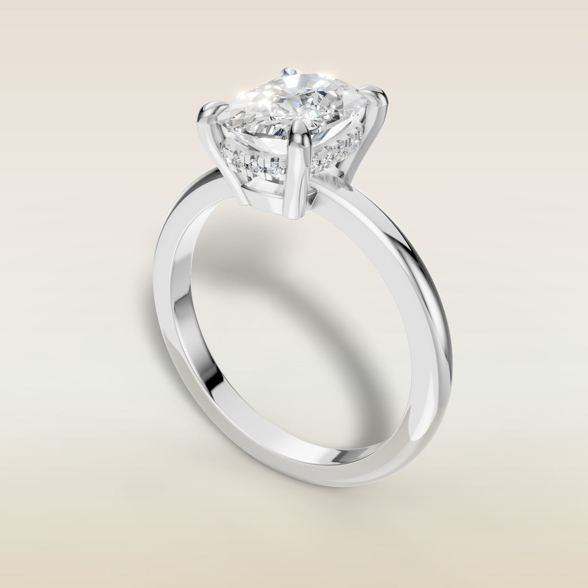 Cushion Low Profile Hidden Halo engagement ring in white gold, angled view