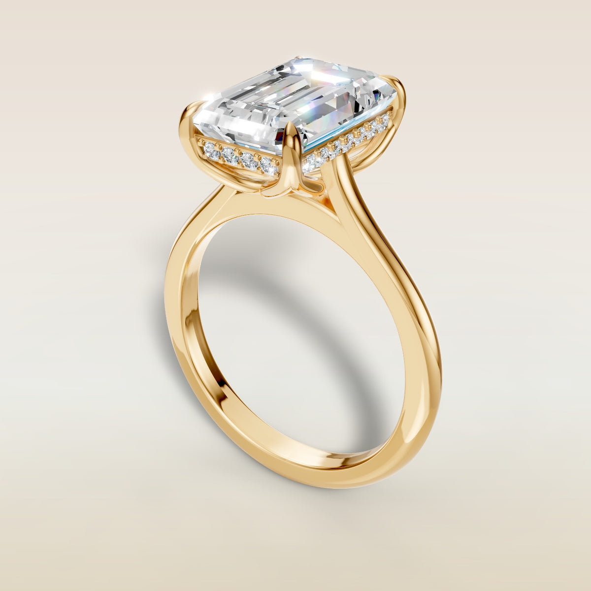 Emerald Tulip with Hidden Halo engagement ring in yellow gold, angled view