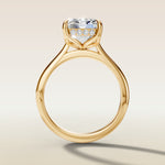 Emerald Tulip with Hidden Halo engagement ring in yellow gold, front view
