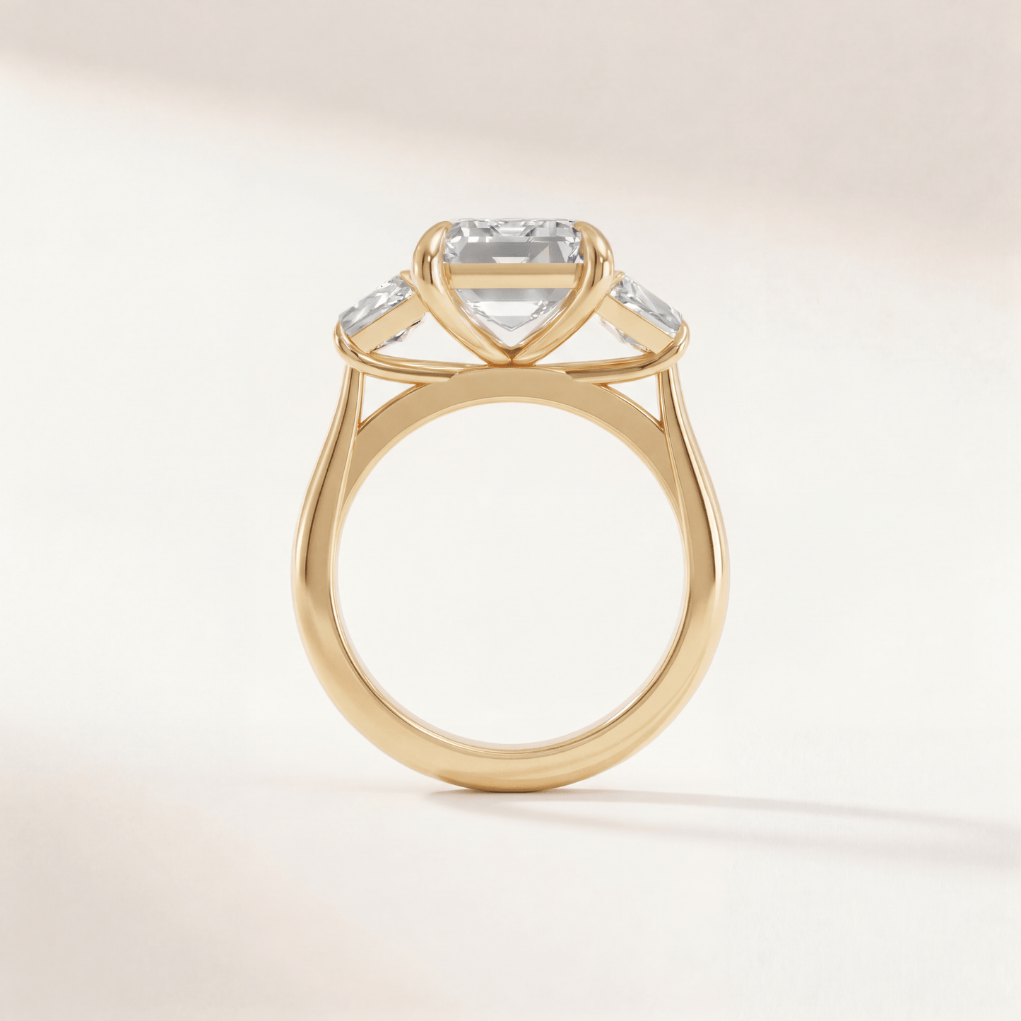 Emerald Three Stone Modern