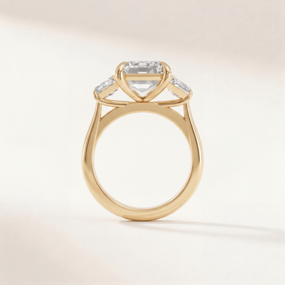 Emerald Three Stone Modern