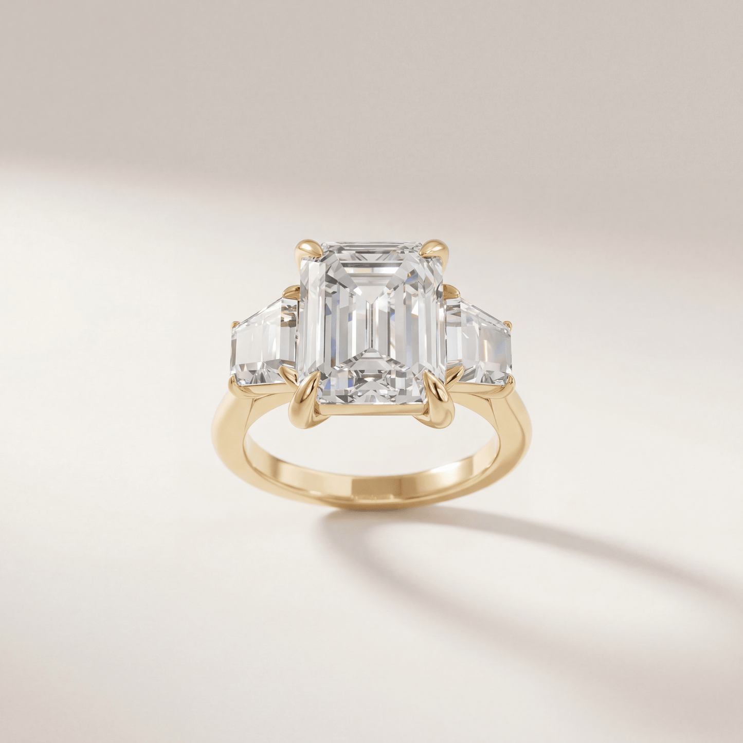 Emerald Three Stone Modern