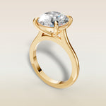 Round Classic Cathedral engagement ring in yellow gold, angled view