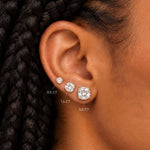Cushion diamond stud earrings size guide on the ear: 0.5, 1.5 and 3.0 carat
