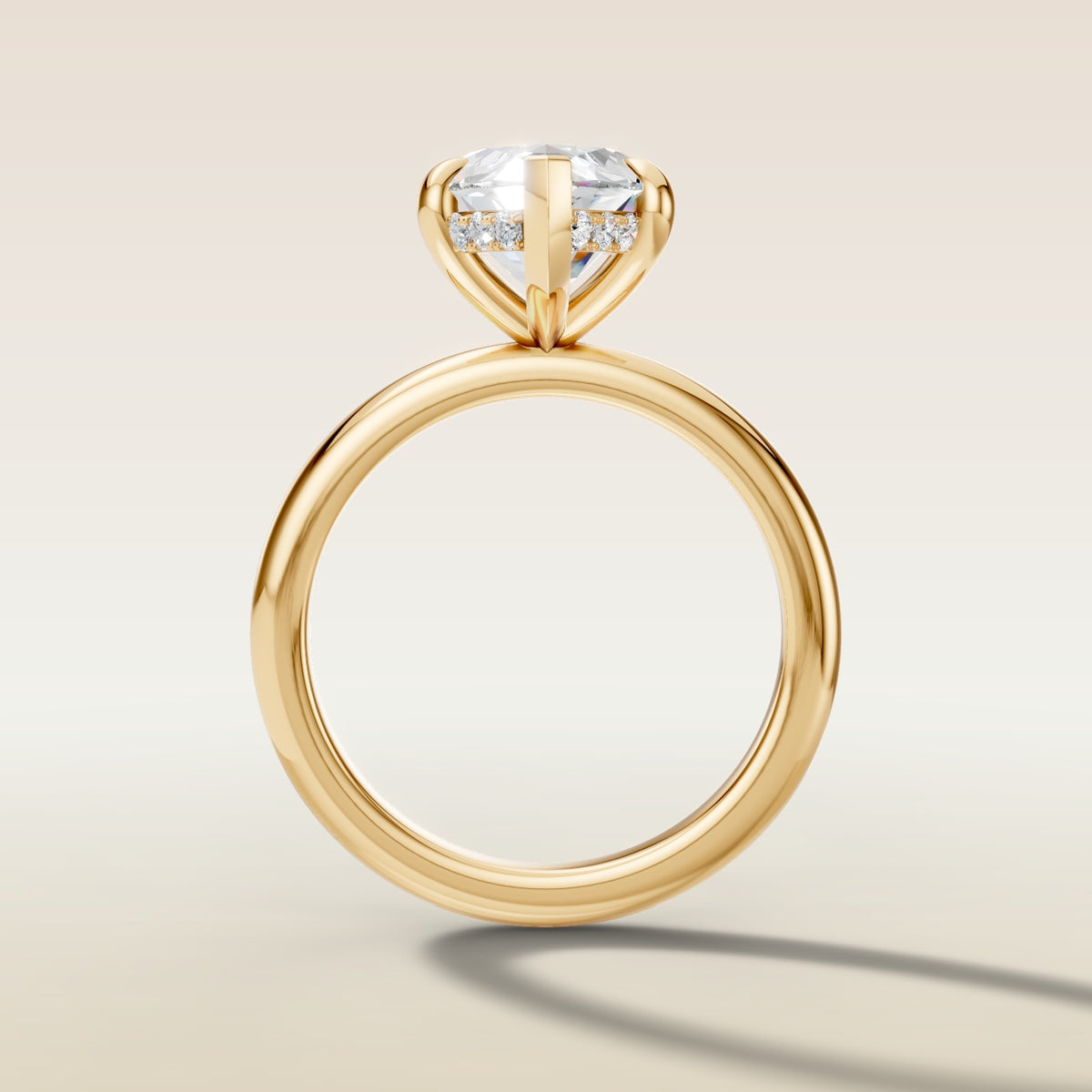 Marquise Hidden Halo Solitaire engagement ring in yellow gold, front view