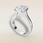 Cushion Full Bezel Cathedral engagement ring in white gold, angled view