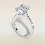 Emerald Six Petal Tulip engagement ring in white gold, angled view