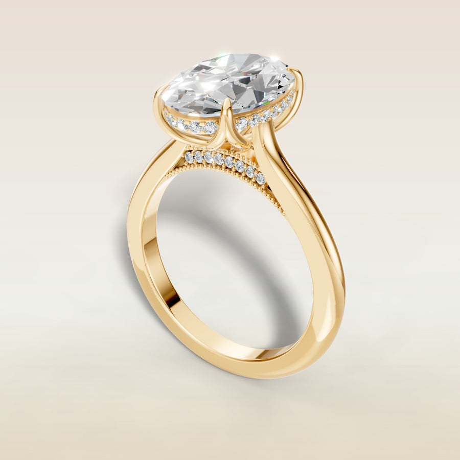 Oval Tulip with Milgrain Diamond Bridge engagement ring in yellow gold, angled view