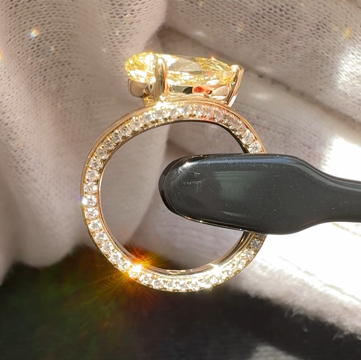 Butter yellow wavy lab grown diamond ring yellow gold side view