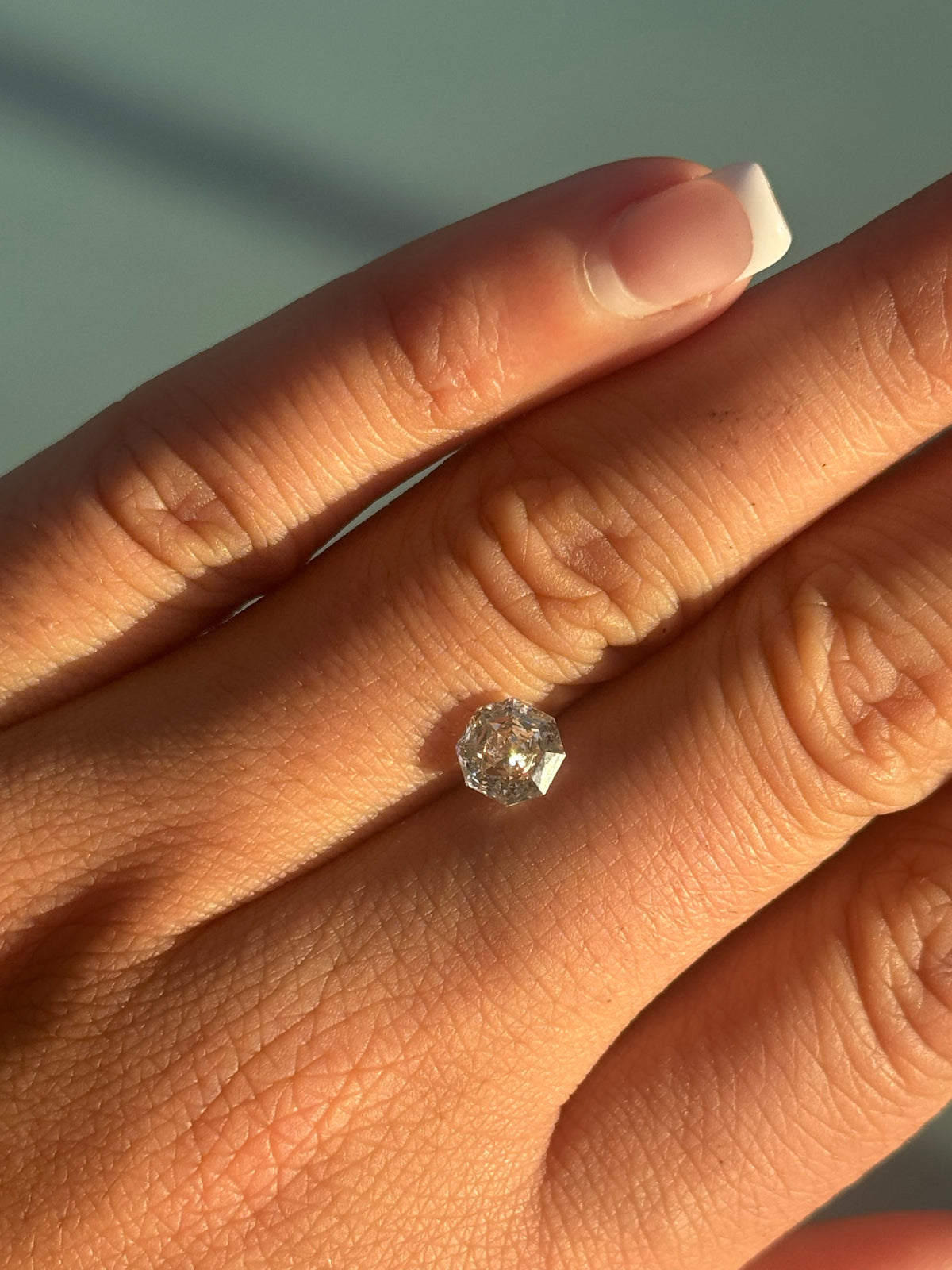 1.24ct rose octagonal champagne diamond on the hand