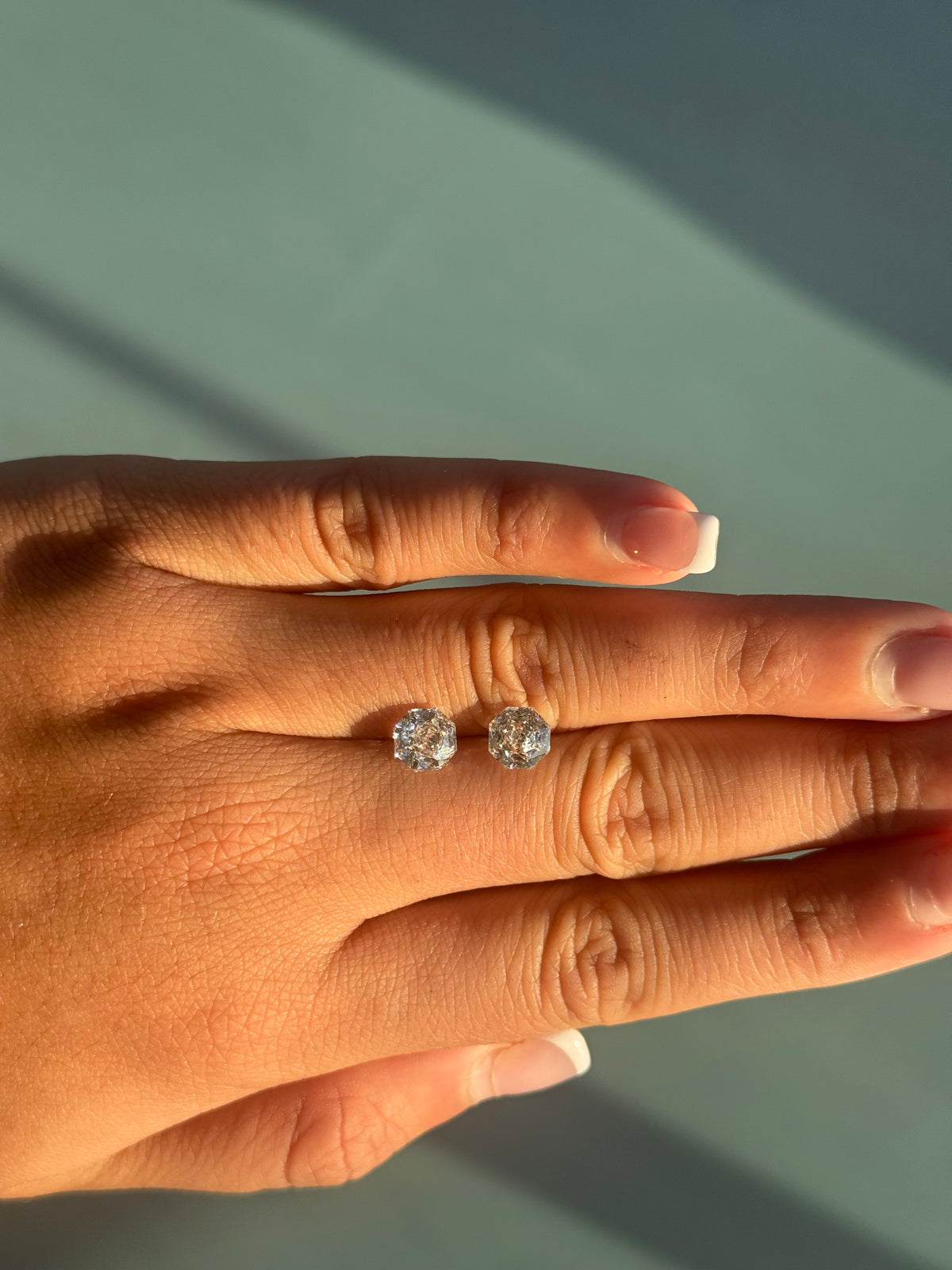 Pair of 1.5ct rose octagonal lab diamonds on the finger