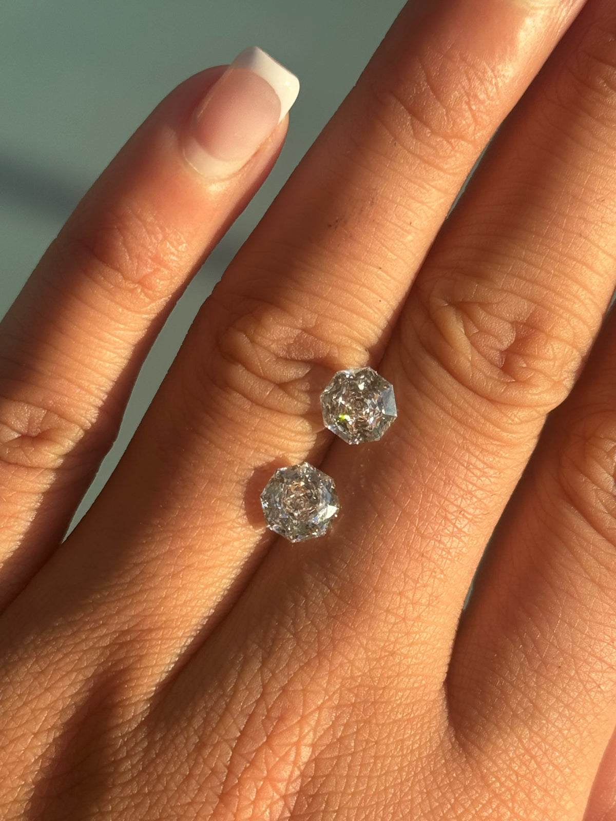 Pair of 1.5ct rose octagonal lab diamonds close up