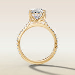 Oval Tulip Hidden Halo Pave engagement ring in yellow gold