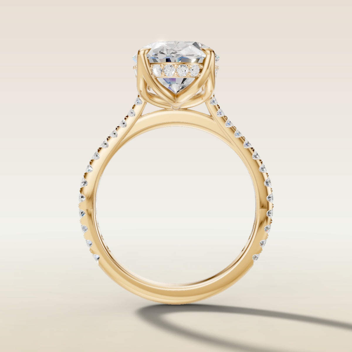Oval Tulip Hidden Halo Pave engagement ring in yellow gold