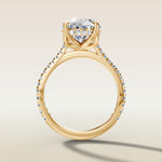 Oval Tulip Hidden Halo Pave engagement ring in yellow gold, front view