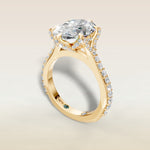Oval Tulip Diamond Signature engagement ring in yellow gold, angled view