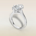 Cushion Compass Set Hidden Halo engagement ring in white gold, angled view