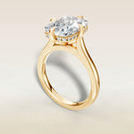 Cushion Compass Set Hidden Halo engagement ring in yellow gold, angled view