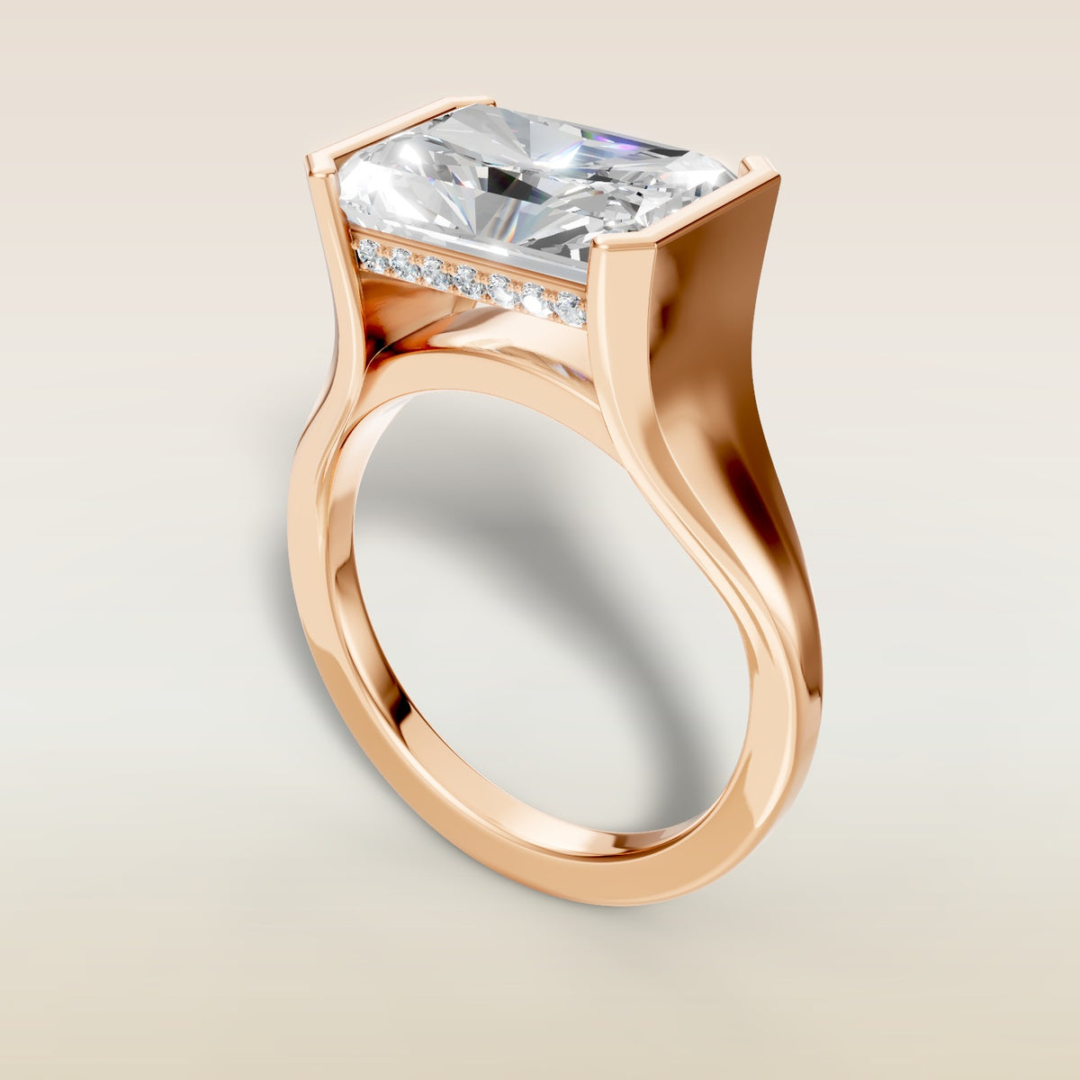 Radiant Half Bezel with Hidden Halo engagement ring in rose gold, angled view
