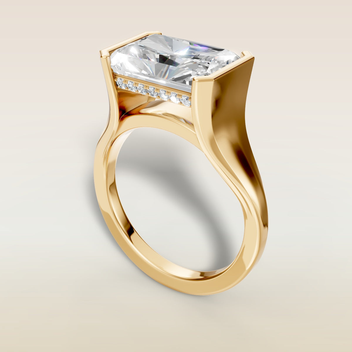 Radiant Half Bezel with Hidden Halo engagement ring in yellow gold, angled view