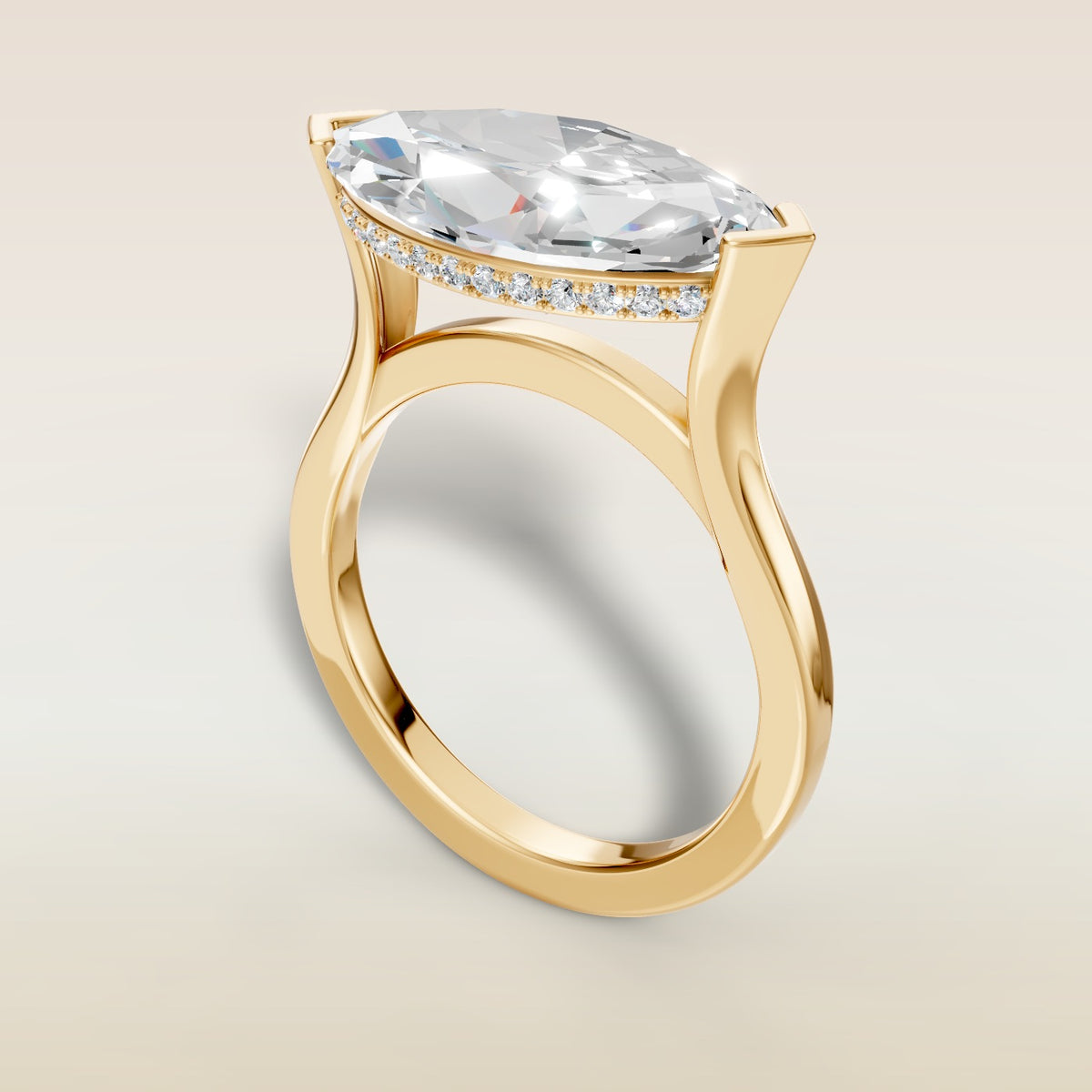 Marquise Half Bezel with Hidden Halo engagement ring in yellow gold, angled view