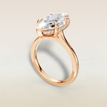 Marquise Hidden Halo Cathedral engagement ring in rose gold, angled view