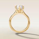 Marquise Hidden Halo Cathedral engagement ring in yellow gold, front view