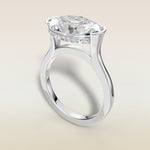 Oval Half Bezel with Hidden Halo engagement ring in white gold, angled view