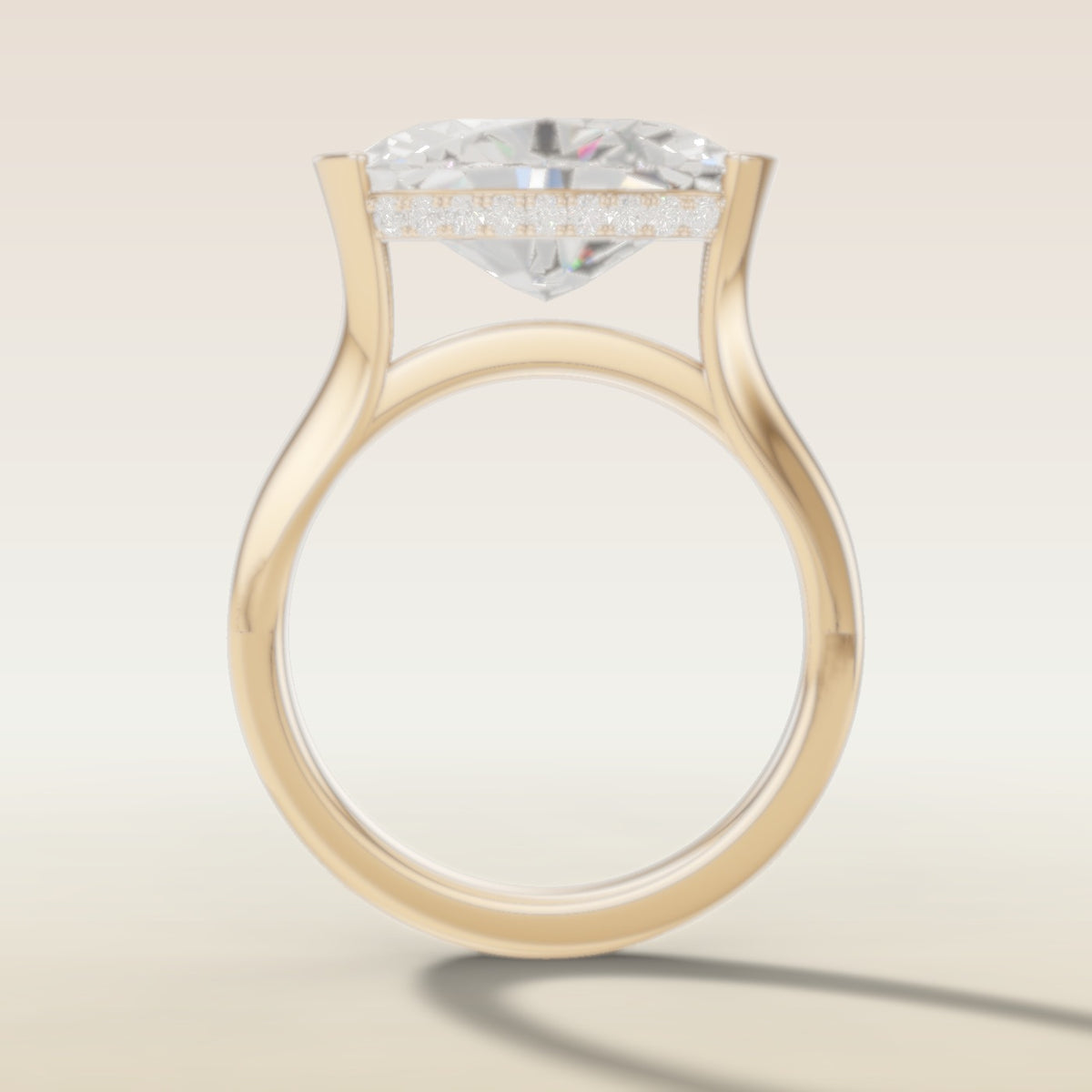 Oval Half Bezel with Hidden Halo engagement ring in yellow gold