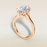 Oval Six Petal Tulip Hidden Halo Split Shank engagement ring in rose gold, angled view