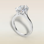 Oval Six Petal Tulip Hidden Halo Split Shank engagement ring in white gold, angled view