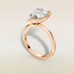 Pear Classic Solitaire engagement ring in rose gold, angled view