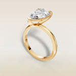 Pear Classic Solitaire engagement ring in yellow gold, angled view