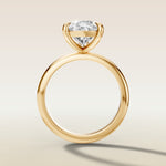 Pear Classic Solitaire engagement ring in yellow gold, front view