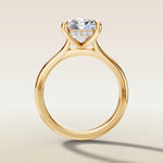 Emerald Hidden Halo Cathedral engagement ring in yellow gold, front view